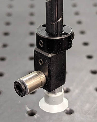 (b) Suction cup fully installed